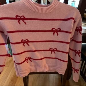Adorable Pink Sweater with Red Bow Accents